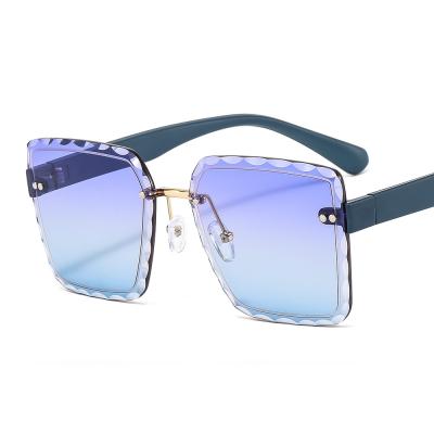 China Fashion Rimless Cat Eye Women Sunglasses Luxury Custom Made Shades Men's Sunglass 2022 Fashion Sunglasses for sale