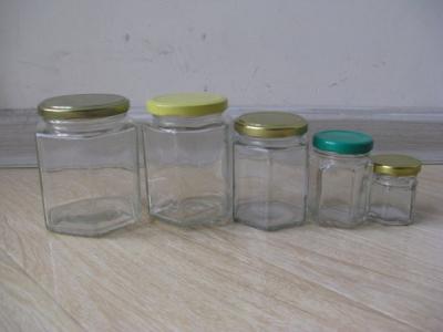 China 280ml clear glass jar for honey/hexagonal glass jars for sale