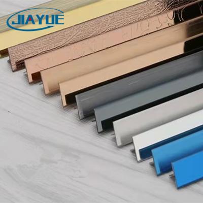 China Modern Foshan Stainless Steel Tile Trim T Shaped 304 Grade Tile Strips Decorative Profiles For Wall Protection for sale