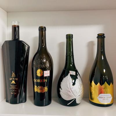 China Hot Selling Cheap Clear Green Empty Beverage Low Price Wine Bottle 750ml Custom Glass Wine Bottles With Cork For Sale for sale