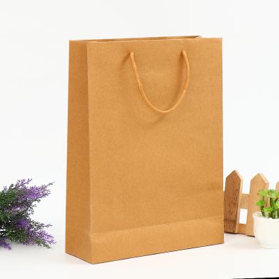 China Recyclable White Recycled Advertising Hand Kraft Paper Bag With Handle for sale