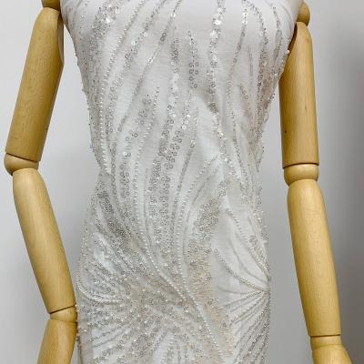 China 2022 breathable good quality bridal beads and mesh base heavy work sequins embroidered fabric for evening dress for sale