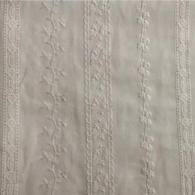 China 2022 fashion breathable high standard china hotsale white cotton eyelet embroidery fabric for lady suits for sale