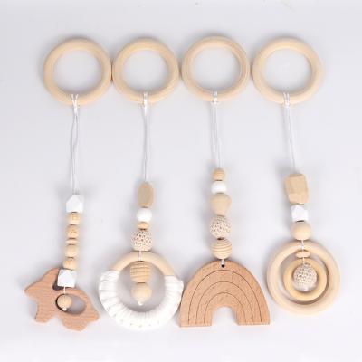 China 2021 Hot Selling Children's Clothing Hot Selling Safe and Harmless Molar Toy Rattle Chain Pacifier Baby Wooden Beech Hanging Ornaments for sale