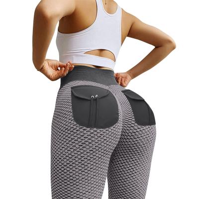 China Breathable Honeycomb Yoga Pants Hip Pocket High Waist Sportswear Tights Fishing Hip Fitness Lifting Pants for sale