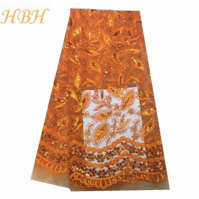 China Viable Wholesale Hot Sale Net Lace Fabric Sequin African Sarees Laces In Orange for sale