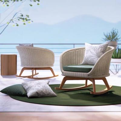 China Garden Style Chair Teak Wood Leg Rattan Sofa Outdoor Rolling Rocking Chair European Handmade/Comfortable Furniture Lazy Chair for sale