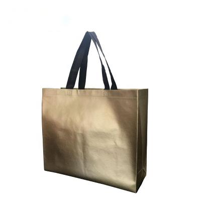 China 2021 Hot Handled Amazon Sale Gold Foil Gift Shopping Bag Shiny Reusable Grocery Non Woven Promotional Tote Bag for sale