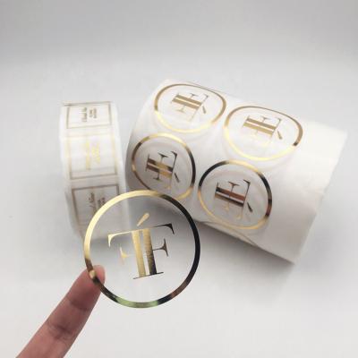 China High Quality Custom Adhesive Sticker Logo Waterproof Clear Gold Foil PVC Stickers Packaging Labels for sale