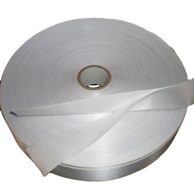 China Adhesive Iron-on PVC Satin Label Hot Melt Adhesive Tape When Stick On Products Need Heat for sale