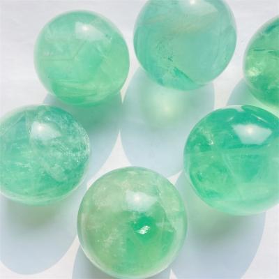 China DONGHAI Cheap Price Natural Healing Crystal Quartz Rainbow Green Fluorite Spheres For Decoration for sale