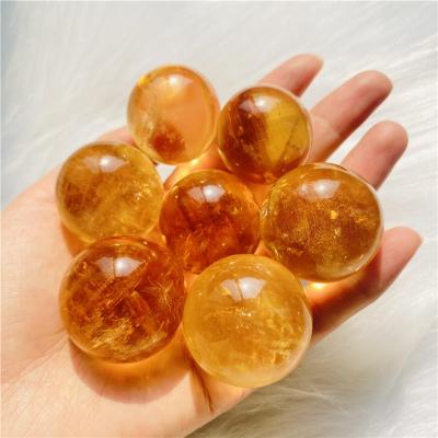 China Natural High Quality Yellow Honey Calcite Spheres Crystal Stone Spar Ball Decoration from DONGHAI Iceland for sale