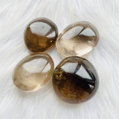 China Natural Stone Crystal Clear Smoky Quartz Tumbled Gemstone Hand Palm from DONGHAI Opens for Maditation for sale