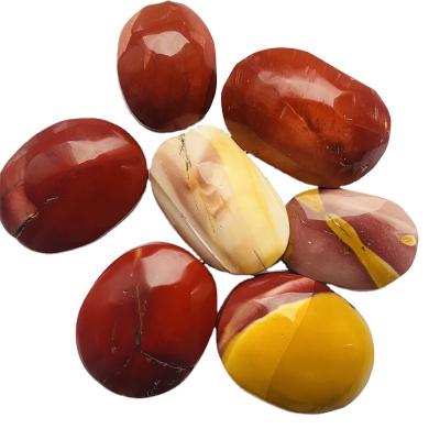 China DONGHAI New Products Healing Natural Crystal Polished Mookite Yolk Palm Stone for Meditation for sale