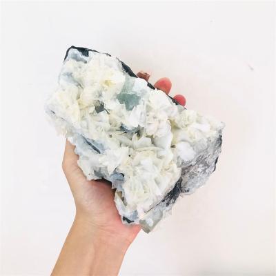 China Wholesale DONGHAI Crystal White Flower Calcite Cluster Fluorescence Raw Ore For Feng Shui for sale