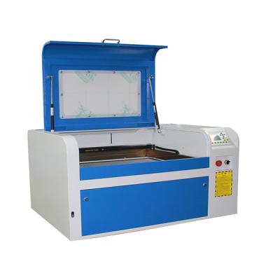 China Water Cooled 50W/60W/80W/100W CO2 Engraving Machine Efr Laser Stone Engraving Machine for sale