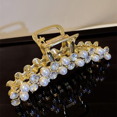 China European and American style South Korea door fashion personality pearl metal cold wind hook hair shark clip designer temperament hair accessories for sale