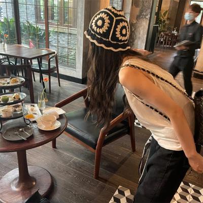 China COMMON Round Brim Logo Crochet Knitted Hat Handmade Crochet Bucket Hat Custom Knit Winter Floral Hats Flower Design Hollow Women Beanie for sale