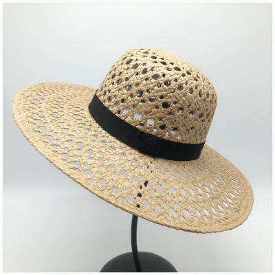 China Striped Women Large Brim Sun Beach Hollow Vellum Straw Hat for sale