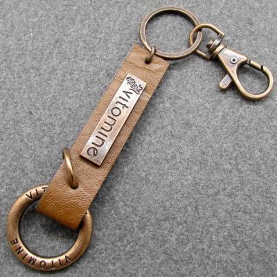 China Sustainable leather label with metal key chain for sale