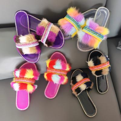 China Custom Colored Luxury Furry Slides Slippers Flat Indoor Summer Indoor Shoes For Women And Ladies Fox Fur Slippers for sale