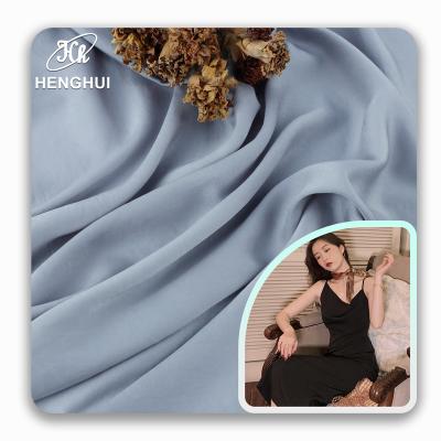 China 95GSM Polyester Wrinkle Resistant Imitation Satin Silk Fabric Luxury Fabric 100% Textiles For Women Clothing Dress Shirt for sale