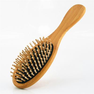 China EXFOLIATING Eco-friendly Detangling Bamboo Oval Massage Wooden Hair Comb Brush Wooden Handle Bamboo Handle for sale