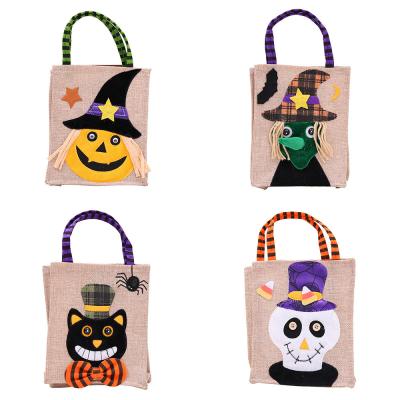 China Nonwoven Trick or Treat Buckets Halloween Gift New Handbags Sack Cross - Body Bag Candy Bag Pumpkin Purse Jewelry Props Gift for 2021 for sale