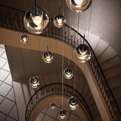 China Modern Designs Staircase Long Indoor Lighting Chandeliers Led Pendant Lamp Glass Ball Hanging Light for sale