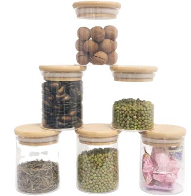 China 10pcs 65*80mm Borosilicate Glass Sealable Jar With Lid Bamboo Food Storage Set Glass Jars for sale