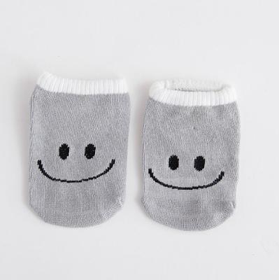 China Smile Face Newborn Baby Socks / Bulk Baby Socks Gray Color Anti Bacterial for sale