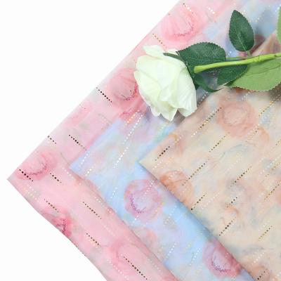 China Breathable Lightweight Gauze Screen Vertical Bandage Tanning Digital Printing Gauze For Women's Skirt Fabric for sale