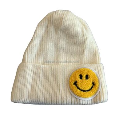 China Autumn And Winter New Children'S JOINT Happy Face S Wool Hat Cartoon Warm Handmade Crochet Knit Hat for sale