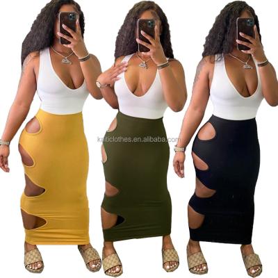 China WJ5203 breathable 2021 spring clothing 7colors solid color cut hollow casual ladies maxi skirt dropshipping for sale