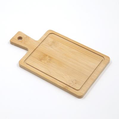 China Sustainable Organic Bamboo Cutting Board with Juice Bowl, Handle Kitchen Board Suitable for Cooking Pizza, Cutting Fruits and Vegetables for sale