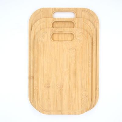 China 2021 Sustainable Bamboo Cutting Board With Handle Easy To Hang And Store Suitable For All Vegetables Deli Cutting Board Wholesale for sale