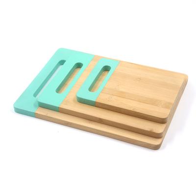 China Viable Set Natural Bamboo Kitchen Cutting Board Wood Cutting Board With Silicone Non-Slip Handle Stylish Chef Gift for sale