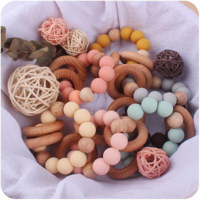 China Soft Toy Premium Material Safe , 100% Durable Bpa Free Silicone Organic Beech Wood Baby Teething Toys for sale