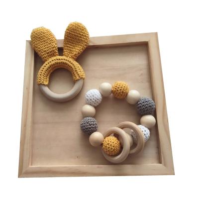 China Cute Safety High Quality Handmade Rabbit Ear Ring Wooden Crochet Baby Knitted Toy Teether for sale