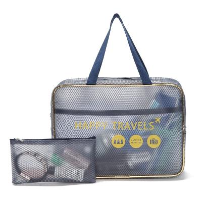 China Reusable Multi Functional Waterproof Travel Cosmetic Bag Clear PVC Vinyl Clear Plastic Toiletry Pouch With Handle for sale