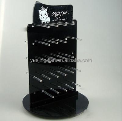 China Sturdy Revolving Black Acrylic Counter Top Display Stand For Pet Accessories for sale