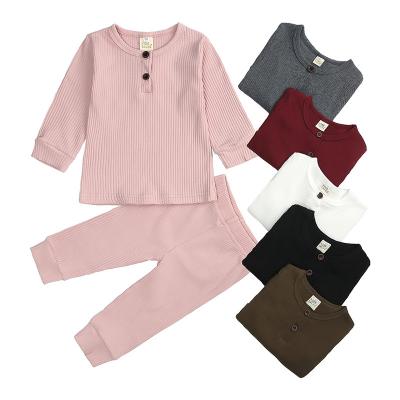 China Wholesale QUICK DRY Newborn Baby 2 Pcs Ribbed Baby Clothes Solid Color Baby Long Sleeve Pajamas Set for sale