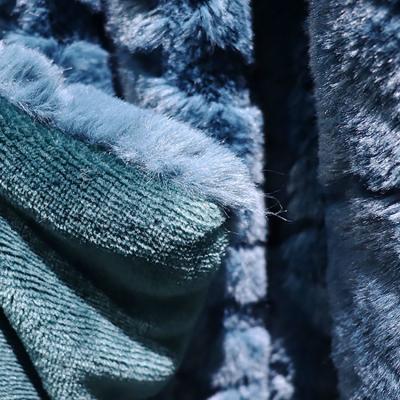 China 100% polyester Fux Fur Throw deken breien Koraal Fuzzy deken OEM Te koop