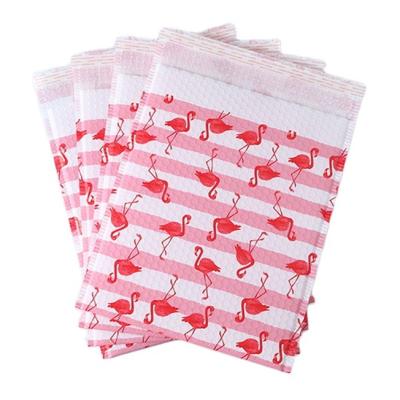 China Strong Adhesive Flamingo Waterproof Envelopes Air Padded Bubble Mailer Packaging Bags Poly Bubble Mailers Shockproof Courier Bag For Shipping for sale