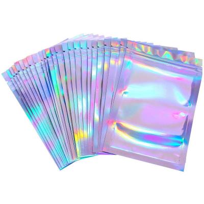 China Custom Resealable Transparent Cosmetic Holographic Packaging Pouch Moisture Proof Bag/Holographic Zip Lock Bag/Holographic Makeup Bag for sale