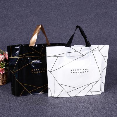 China Low MOQ supplier manufacturing moisture proof pe webshop clothing packaging plastic bags black white black custom printed shopping bags with handles for sale