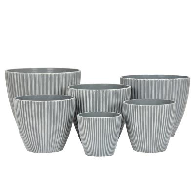 China Modern popular outdoor garden table top round vertical stripe flower pots and planters for sale