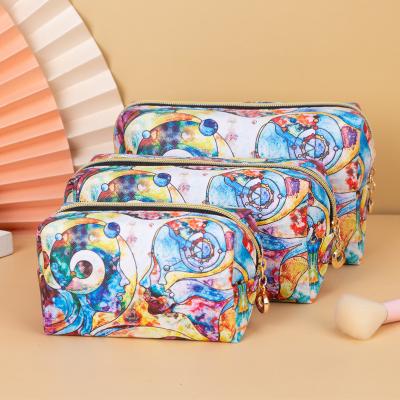 China Lady and Girls 2022 Custom PU Leather Waterproof Printing Open Cosmetic Bag Zipper Cosmetic Bag Travel Pouch Laundry Bag Women Cute Make Up Bag for sale