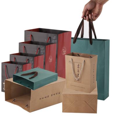 China Recyclable Luxury Folding Craft Paper Shopping Bag Small Packaging Paper Bag Custom Exclusive Logo With Customize Name for sale