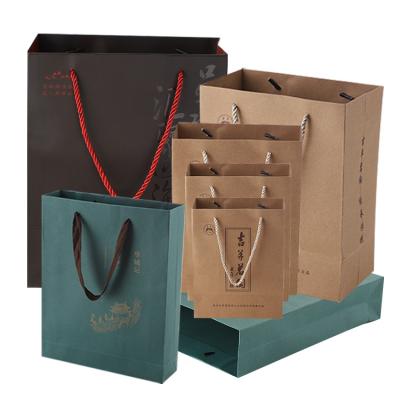 China Premium Recyclable Private Label Supermarket Paper Shopping Bag Thank You Printing Logo Kraft Paper Gift Packaging Bag for sale